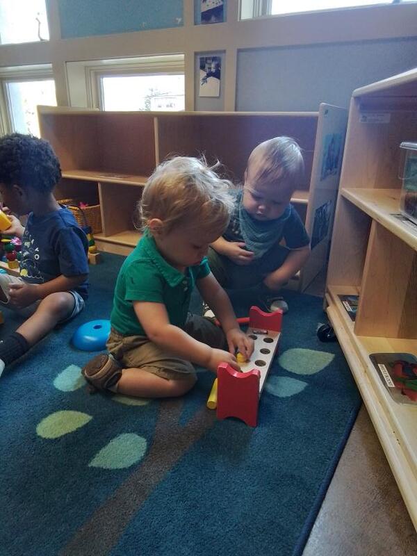 Toddler playing with a toy n Lancaster Early Education Center Toddler Room